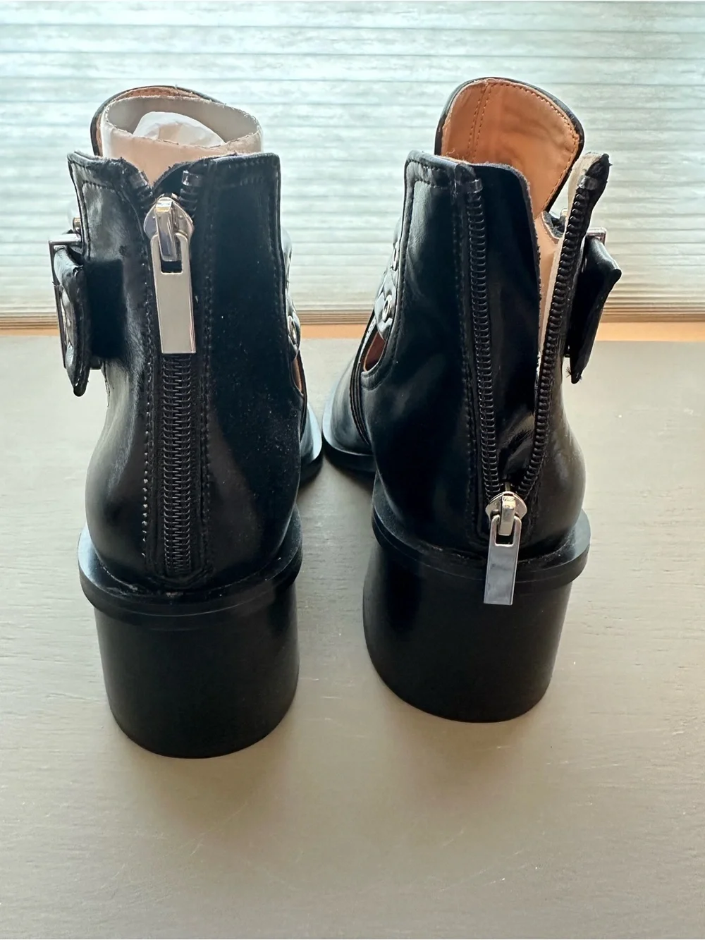Steve Madden “Gatewood” Black Leather Cutout Ankle Booties with Buckle Straps